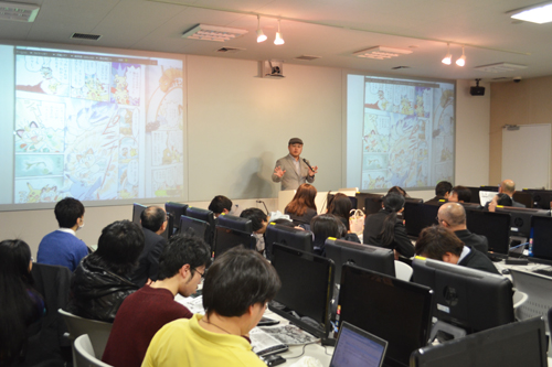 Yoshimura, the director of the Kyoto International Manga Museum Research Center and the head of the Kyoto Seika University Manga Department at the first meeting of the Kyoto Manga and Anime Society. Mr. Kazuma = February 14, 2015, The Kyoto College of Graduate Studies for Informatics Kyoto Station Satellite