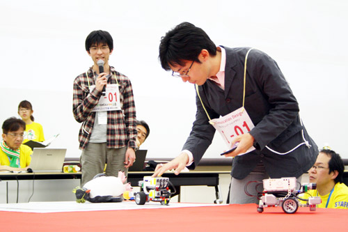 KCGI team demonstrating a robot that patrols a nursing home