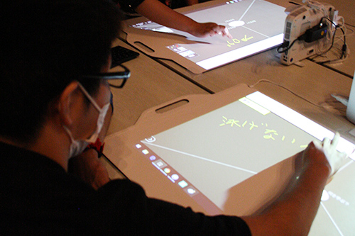 Desk-top projection type electronic blackboard system with the advantage of direct hand writing