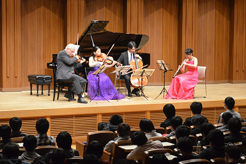 The hall was filled with the soft music of the classical concert 
