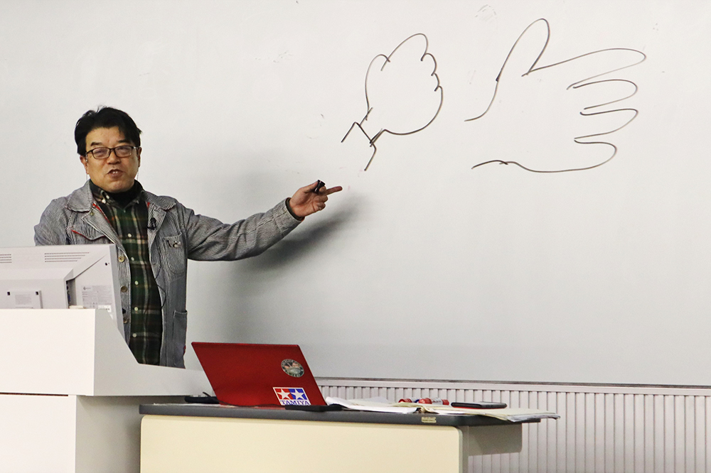 Takami Akai, President of Yonago Gainax Corporation, explains the methodology used during animation production in a series of lectures entitled