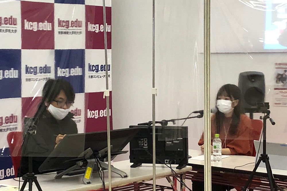 The KCG booth at KyoMafu (September 19-20), where live drawing transmissions by professional animators were performed through a guard film as a measure against infection.