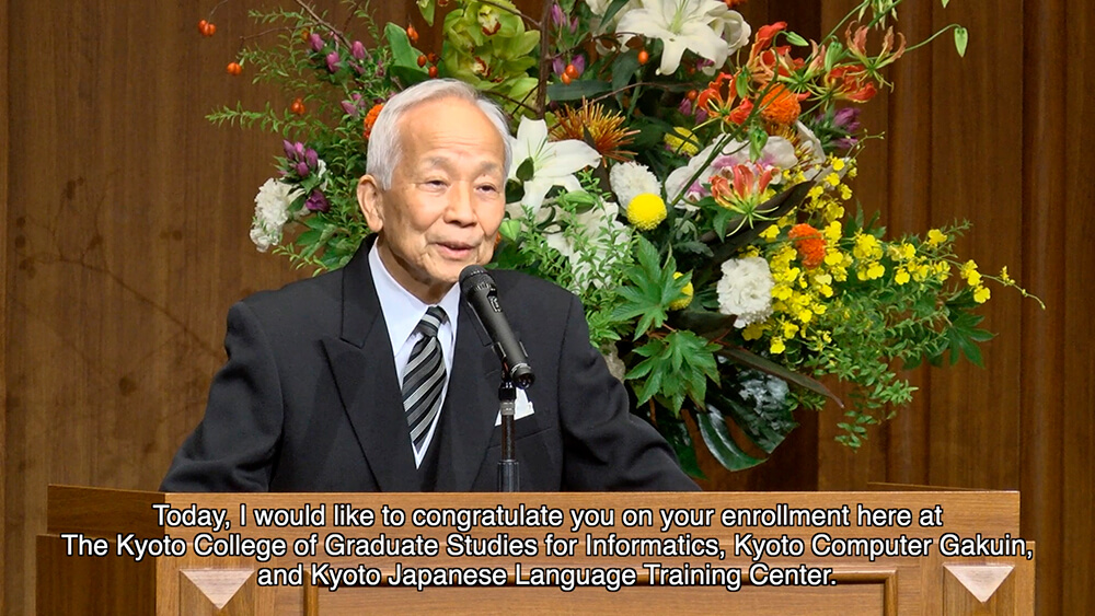 KCGI President Toshihide Ibaraki delivers his ceremonial address via video streaming