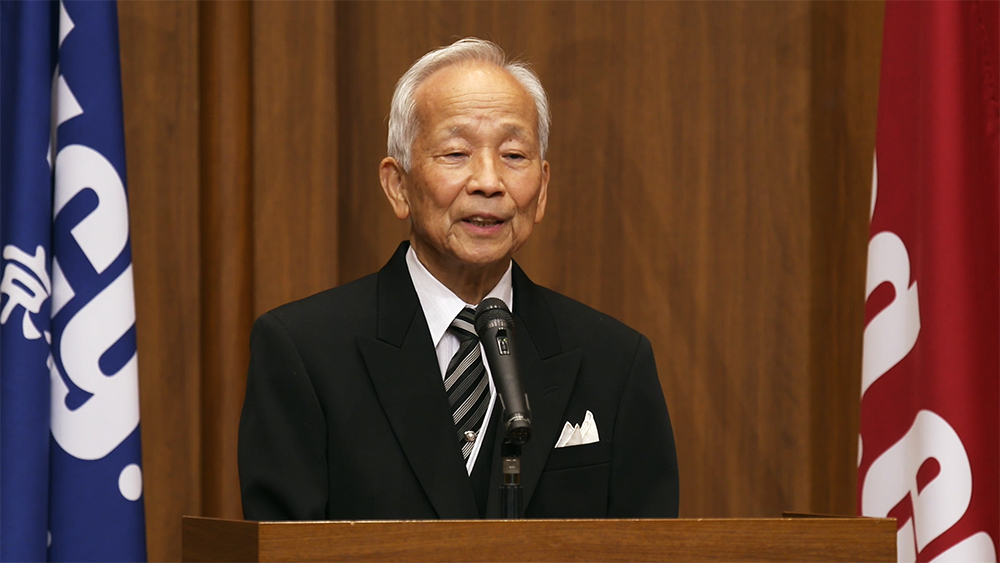 KCGI President Toshihide Ibaraki delivers his ceremonial address via video streaming