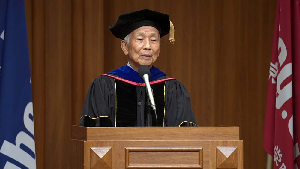 KCGI President Toshihide Ibaraki delivers his ceremonial address via video streaming