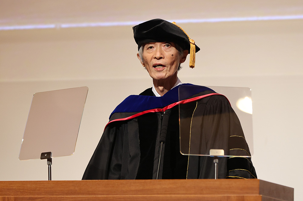 KCGI President Shinji Tomita encourages graduates at the ceremony.