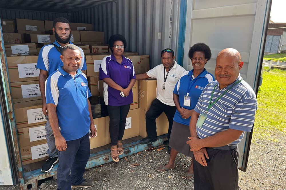 PCs and staff arrive at the Papua New Guinea Institute of Technology (November 6).