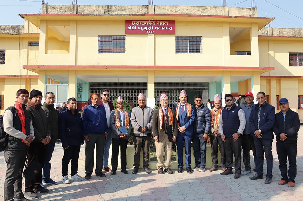 Vice President Houichi Domochi (center right) visits the TU Mechi Multiple Campus and poses for a photo with President Zee Van Pokharel (center left) and others on January 5, 2024.